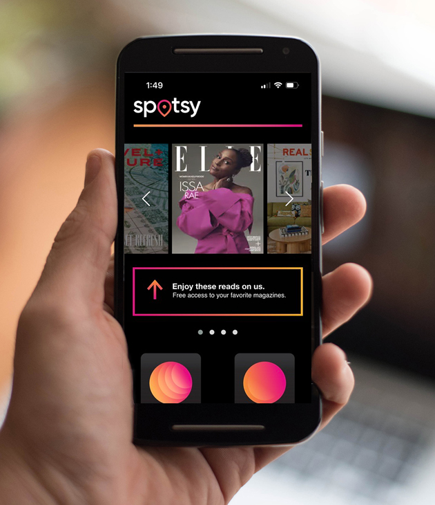 Phone with Spotsy app on it